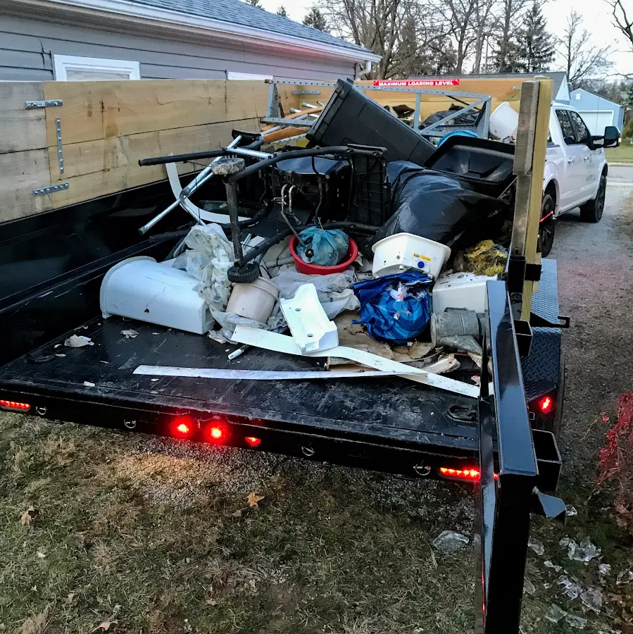 Roll-off dumpster delivered to a residential driveway in Bangor